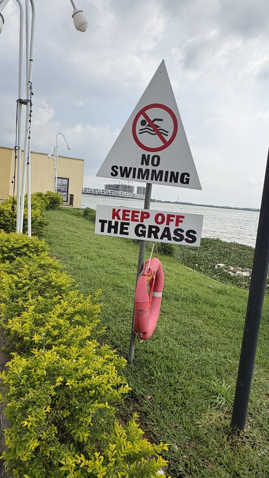No swimming, keep off the grass